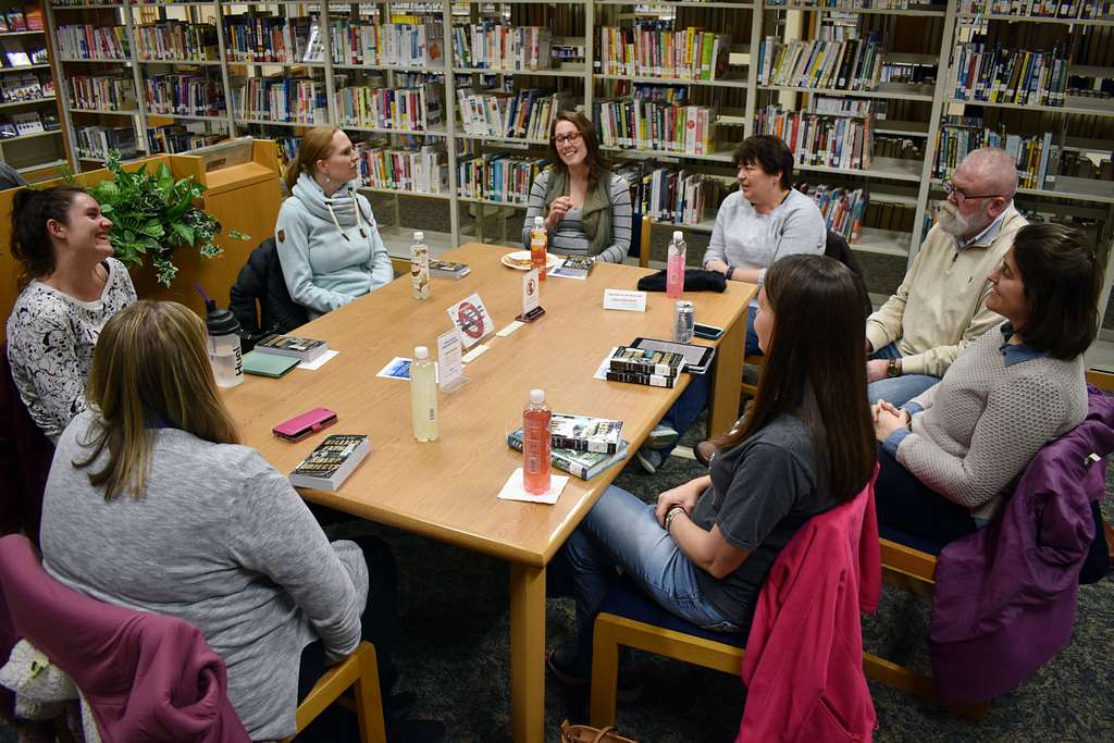 Members of the Book Club for Adults discuss a book during a monthly meeting at the Sagamihara Family Housing Area Library, SFHA, Japan, Jan. 21, 2020.