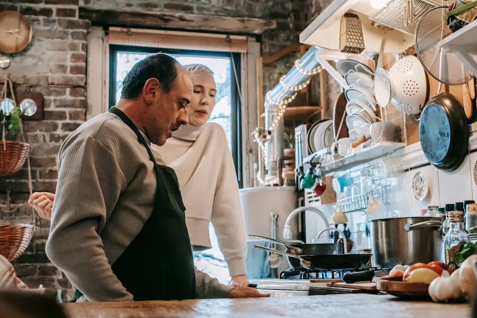 Photo by Gary Barnes: https://www.pexels.com/photo/focused-diverse-spouses-cooking-in-kitchen-at-home-6248800/