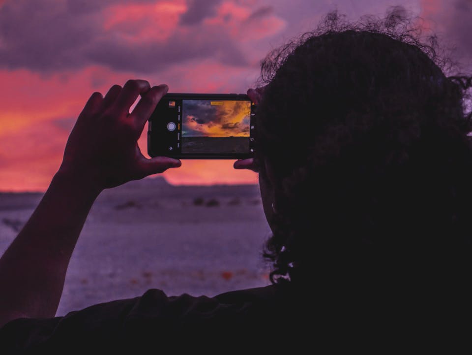 Person Taking A Photo by Prime Cinematics : https://www.pexels.com/photo/person-taking-a-photo-2056961/