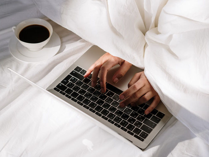 Photo of hands on laptop by cottonbro from Pexels.